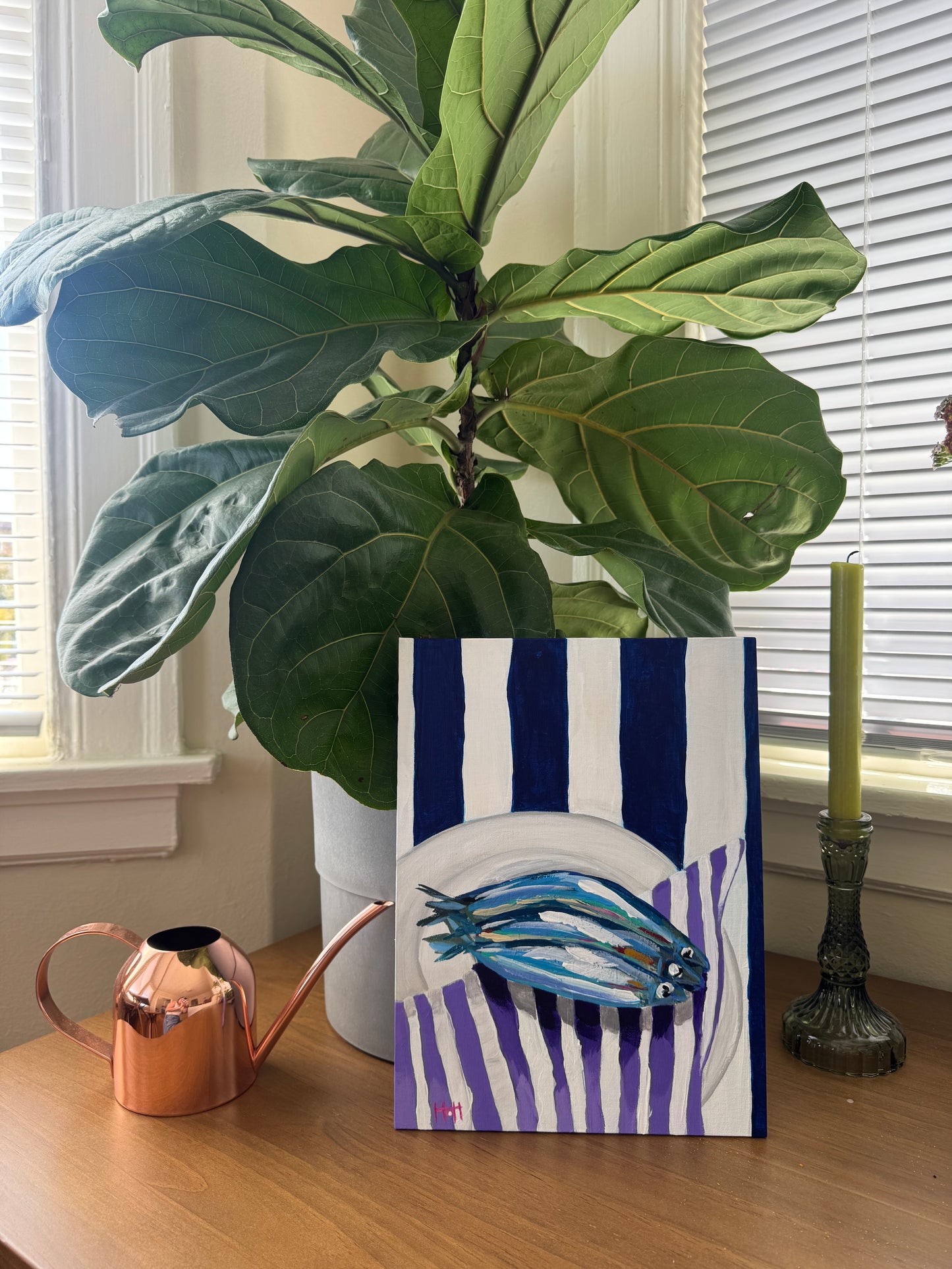 Sardines on purple napkin